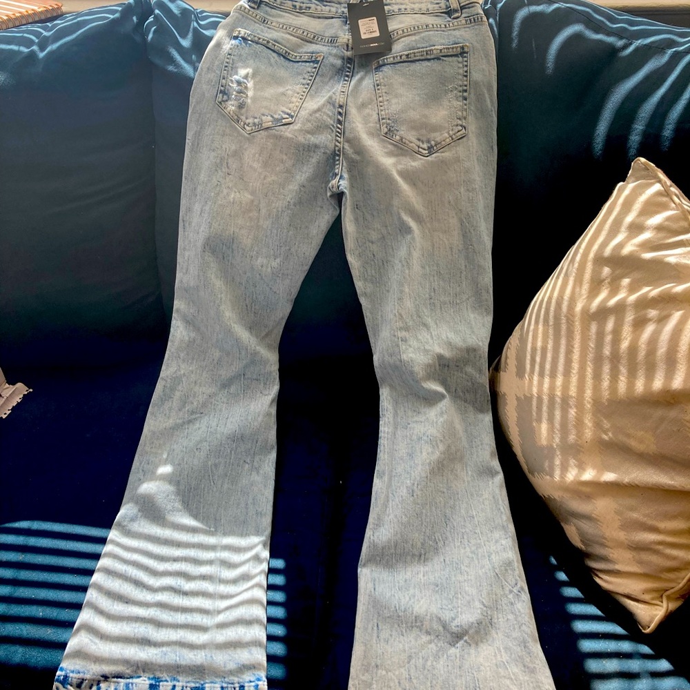 Ripped Flare Jeans-  never worn